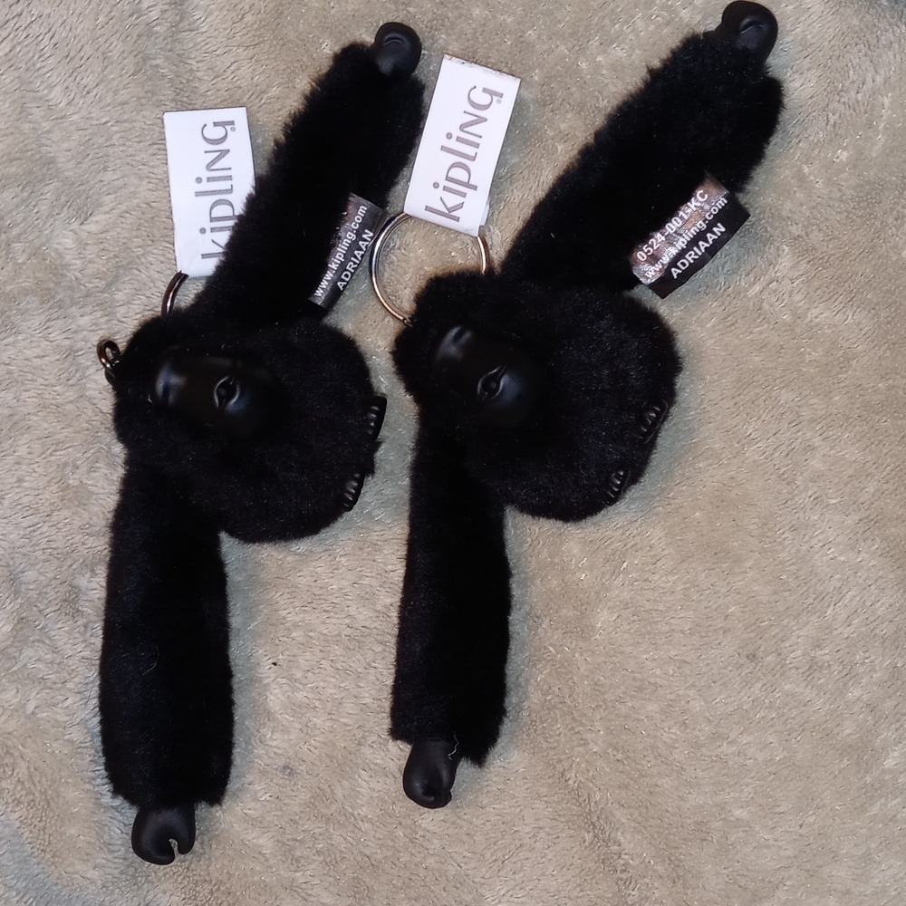 2 Kipling Sven Key Charms